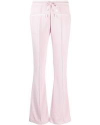 Courreges - Logo-patch Flared Trousers - Lyst
