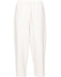 PUMA - Pantalones de chándal con logo bordado - Lyst