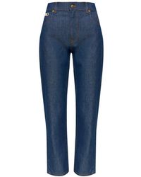Moschino - Logo-Patch Tapered Jeans - Lyst