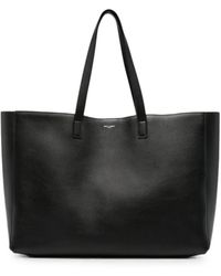 Saint Laurent - Logo-Stamp Leather Tote Bag - Lyst