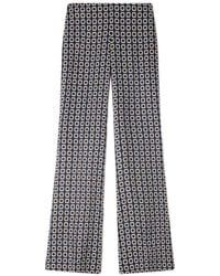 Sandro - Floral-Print Flowy Trousers - Lyst