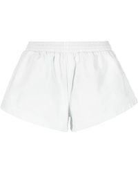 Balenciaga - Pantalones cortos acampanados con cintura elástica - Lyst