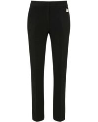 JW Anderson - Pantalones slim con detalle de candado - Lyst