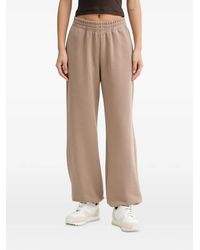 La Mania - Axel Logo-Embroidered Elasticated Track Pants - Lyst