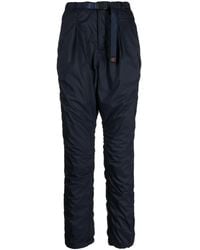 Undercover - Logo-Tag Buckle-Fastening Tapered Trousers - Lyst