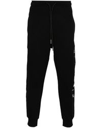 John Richmond - Logo-embroidered Tapered Trousers - Lyst