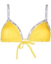 Calvin Klein - Top de bikini con logo estampado - Lyst