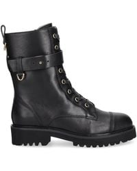 Coccinelle - Buckled-Strap Lace-Up Combat Boots - Lyst