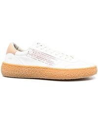 PURAAI - Slogan-Print Low-Top Sneakers - Lyst