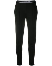 Calvin Klein Pantalones tapered con logo en la cinturilla - Negro