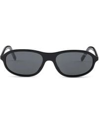 Prada - Lunettes De Soleil À Plaque Métallique Emblématique - Lyst