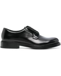 Prada - Zapatos oxford con logo en relieve - Lyst