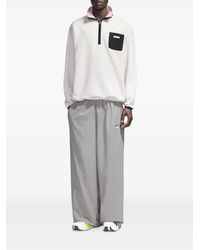 flâneur - Badge Half-Zip Sweatshirt - Lyst