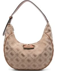 Guess - Schultertasche mit Logo-Schild - Lyst