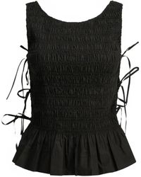 Ganni - Smocked-Effect Peplum Top - Lyst