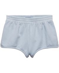 Prada - Triangle-patch Jersey Mini Shorts - Lyst