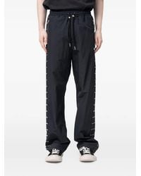 THUG CLUB - Triple Line Stud Stud-Detail Trousers - Lyst