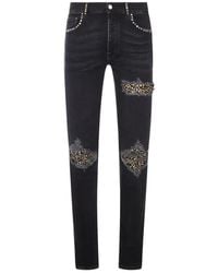 Amiri - Stud-Embellished Distressed Jeans - Lyst