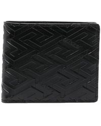 Versace - Embossed-monogram Bi-fold Wallet - Lyst