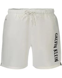 Calvin Klein - Logo-Print Drawstring Swim Shorts - Lyst