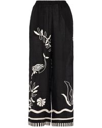 Eres - Broek Met Bloemenprint En Wijde Pijpen - Lyst
