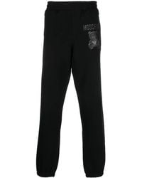 Moschino - Logo-Print Organic Cotton Track Pants - Lyst
