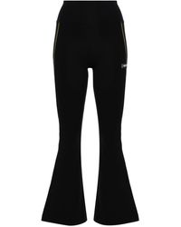 Versace - Flared legging Met Logo-applicatie - Lyst
