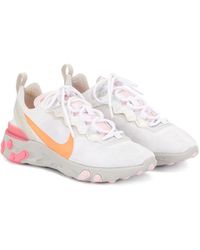 nike training flex trainers in grey with peach swoosh