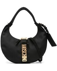 Moschino - Crescent Schultertasche mit Logo-Schild - Lyst