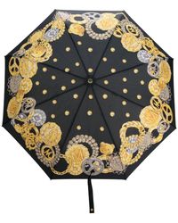 Femme Accessoires Parapluies Parapluie à logo imprimé Moschino en coloris Jaune 
