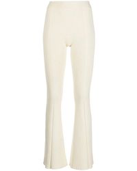 Aeron - Ribbed-Knit Flared Trousers - Lyst