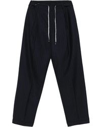 Maison Margiela - Pinstriped Wool Trousers - Lyst