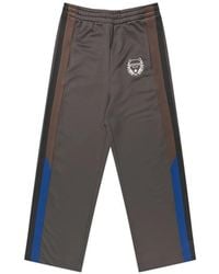Munthe - Vexation Logo-Embroidered Side-Stripe Track Pants - Lyst