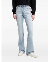 Benetton - Flared Jeans - Lyst