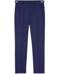 Versace - Pantalones ajustados con pinzas - Lyst