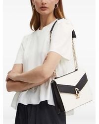 Custommade• - Haut Péplum À Manches Bouffantes - Lyst