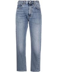 TOTEME - Jeans recortados de - Lyst
