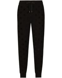 Dolce & Gabbana - Pantalones de chándal con monograma en relieve - Lyst