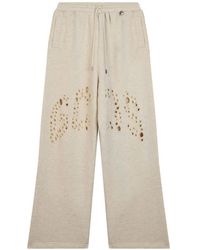 Gcds - Logo-Perforated Laser-Cut Track Pants - Lyst