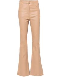 Remain - High-waist Leather Flared Trousers - Lyst
