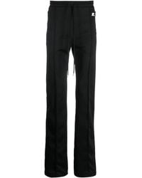 Courreges - Pantalones con parche del logo y cordones - Lyst