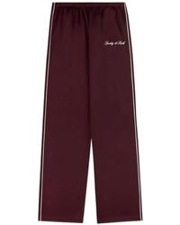 Sporty & Rich - Logo-Print Side-Stripe Track Pants - Lyst