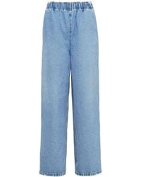 Prada - Triangle-logo Mid-rise Loose-fit Jeans - Lyst