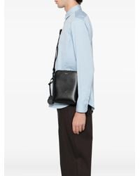 Bally - Logo-print messenger bag - Lyst