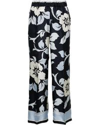 P.A.R.O.S.H. - Pantalones rectos con estampado floral - Lyst
