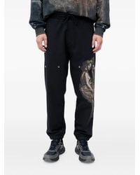 HUGO - Jogginghose mit grafischem Print - Lyst