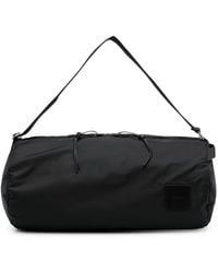 Jil Sander - Logo-Patch Circular Duffle Bag - Lyst