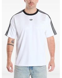 adidas - Jacquard-T-Shirt mit Logo-Streifen - Lyst