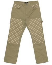 Amiri - Monogram-Pattern Panelled Trousers - Lyst