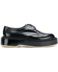 Undercover Derbies à semelle à plateforme - Noir